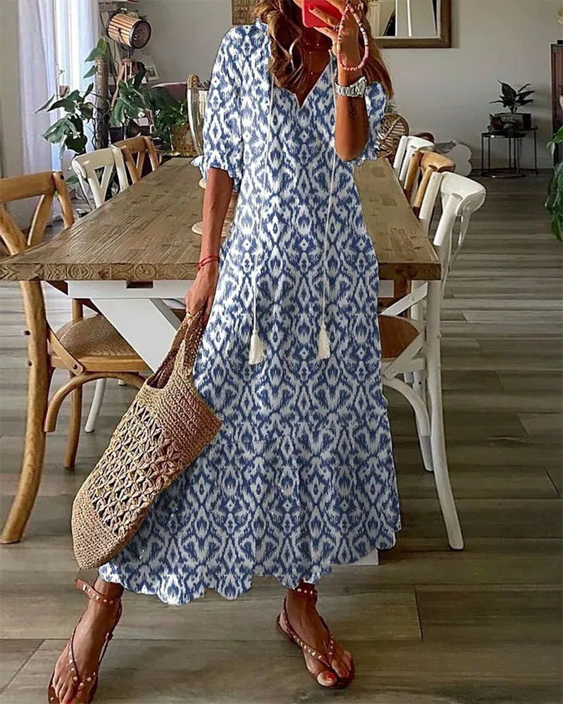 Boho tummy coverage dress, blue patterned short-sleeve with V-neck and tiered hem