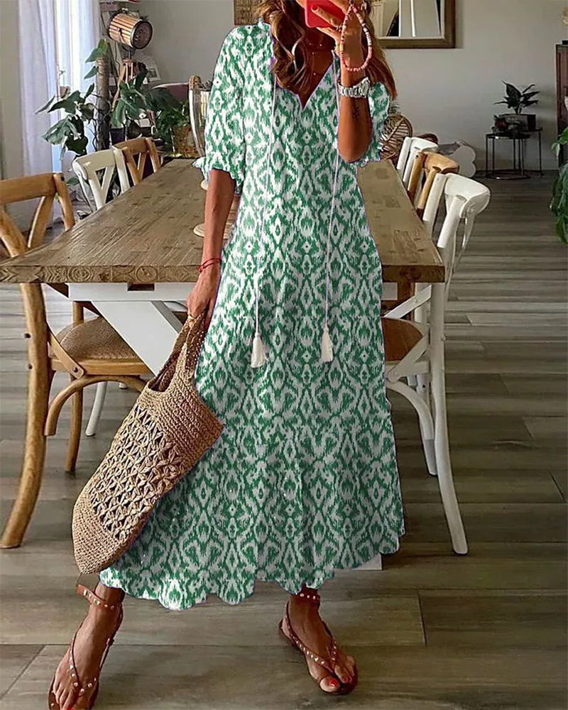Boho tummy coverage dress, green patterned short-sleeve with V-neck and tiered hem