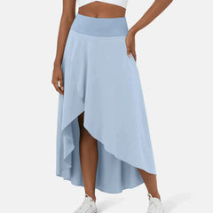 Asymmetric midi skirt in light blue with high-low hem and draped side panel
