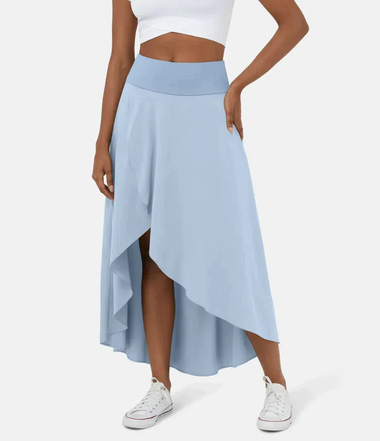 Asymmetric midi skirt in light blue with high-low hem and draped side panel