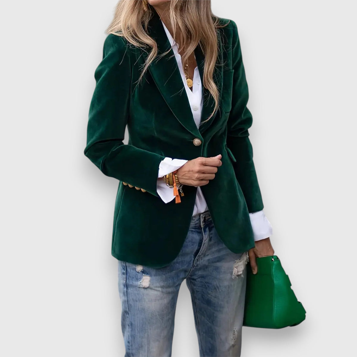 Women’s green blazer with notched lapels, single button, and two front pockets