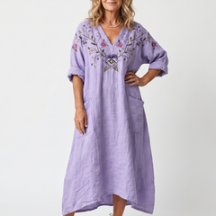 Purple floral pocket midi dress with V-neck and embroidered puff sleeves