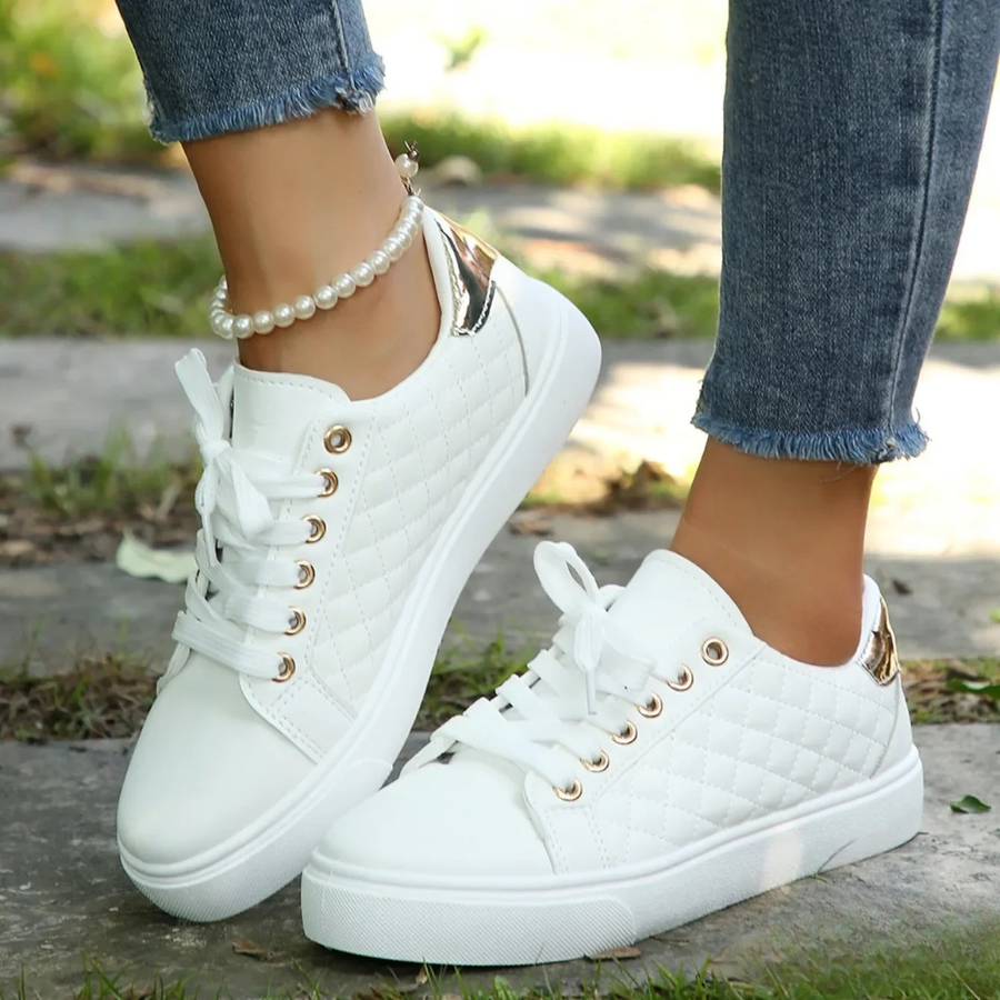 Women’s quilted lace-up trainers in white, gold eyelets and metallic heel trim