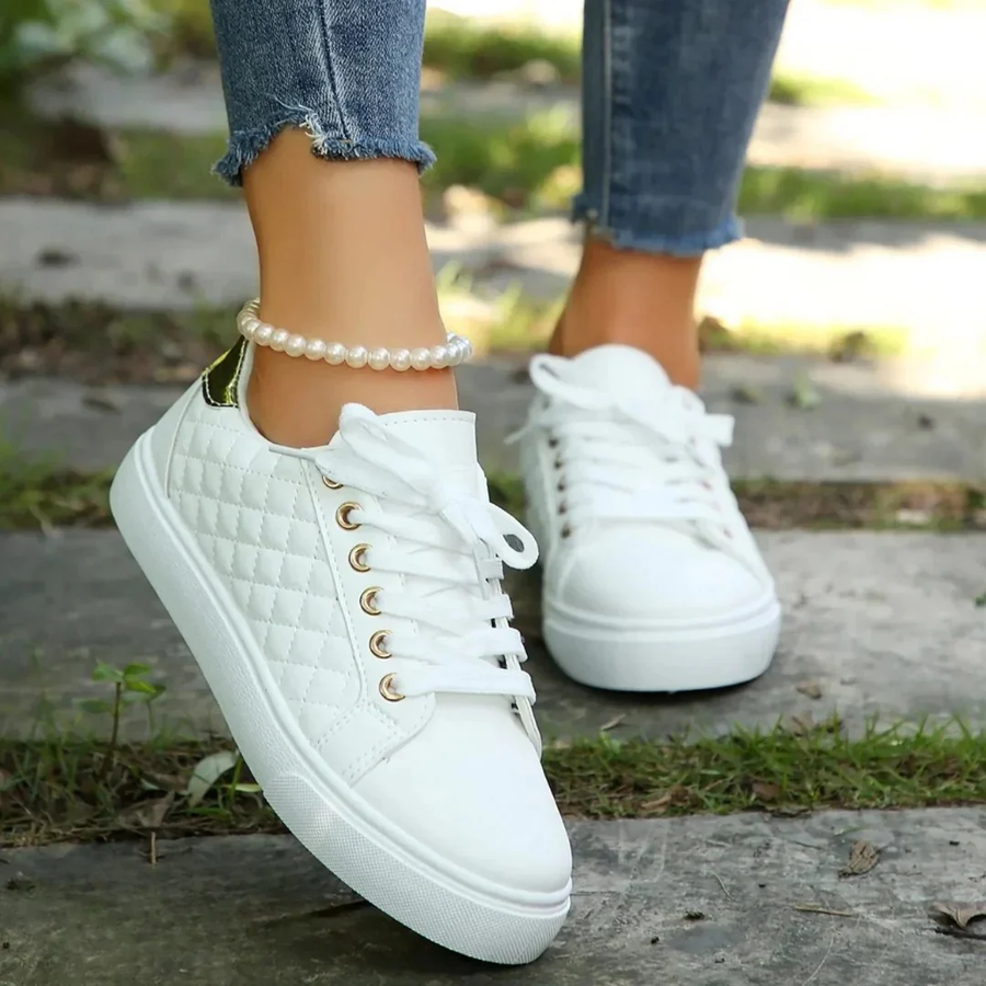 Women’s quilted lace-up trainers in white, lace-up front with gold eyelets