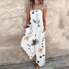 White sleeveless floral printed overalls with wide legs and botanical pattern