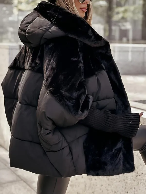 Black plush hooded jacket with thick padded body and faux-fur collar