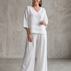 White layered V-neck top with wide-leg pants set, front full-length view