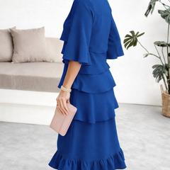 Blue ruffle tier midi dress with short cape sleeves and layered skirt