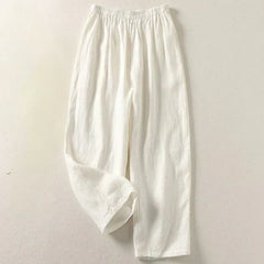 White lightweight trousers with elastic waistband and pleated front