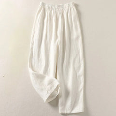 White elastic-waist comfortable everyday trousers with loose, tapered legs