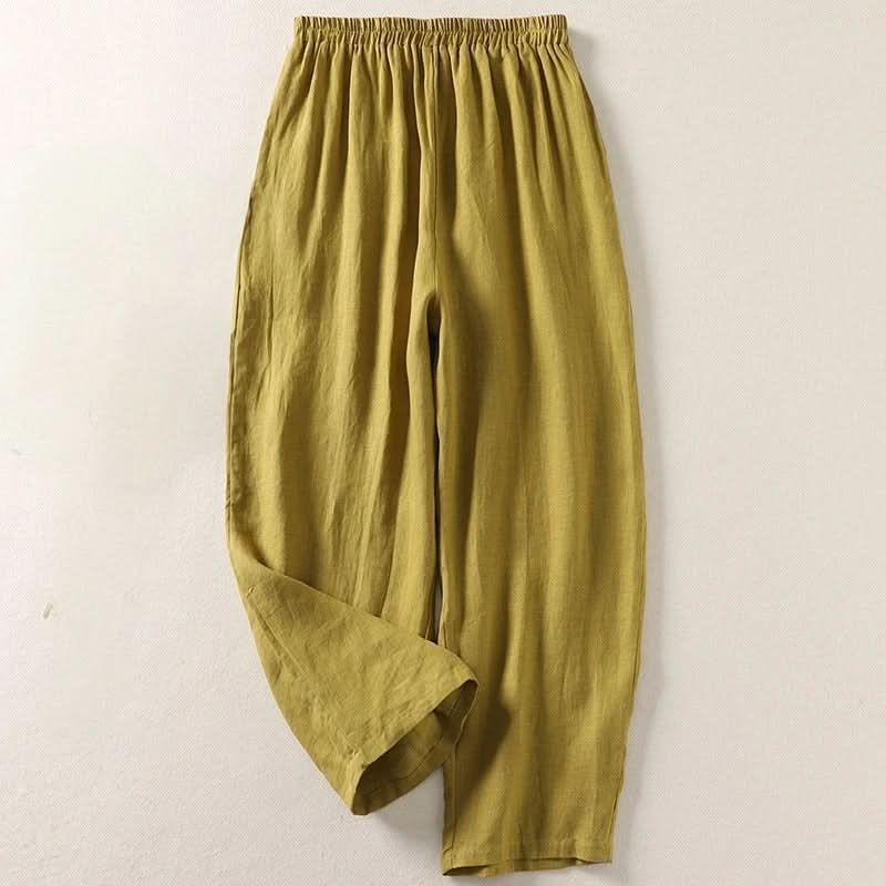 Olive cotton-linen pants with elastic waistband and loose wide-leg design