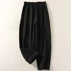 Black lightweight trousers with elastic waistband and relaxed straight leg