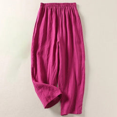 Pink elastic-waist comfortable everyday trousers with loose, tapered legs