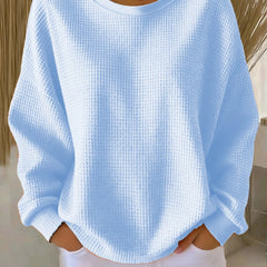 NYLA classic sweater in light blue waffle-knit, crewneck, long sleeves with ribbed cuffs.