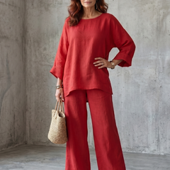 Red oversized tunic and wide-leg pants set with cuffed sleeves and relaxed fit