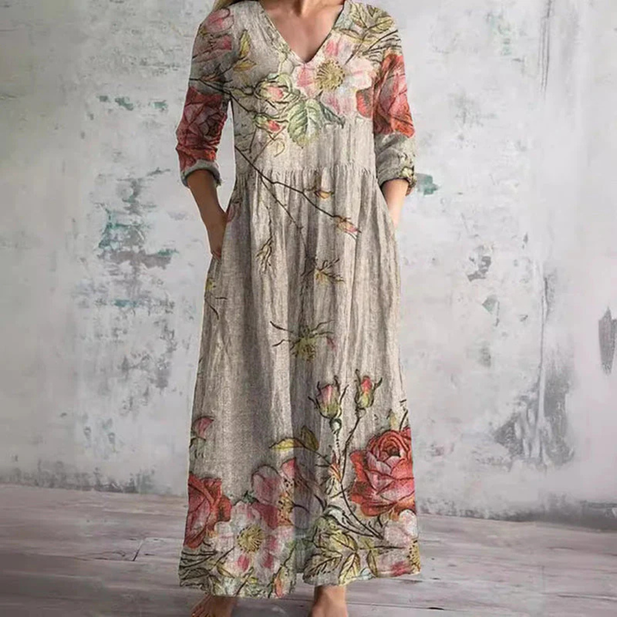 Floral summer dress in beige with V-neck, long sleeves, tiered maxi skirt