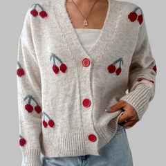 White long-sleeve cardigan sweater with cherry print, round red buttons
