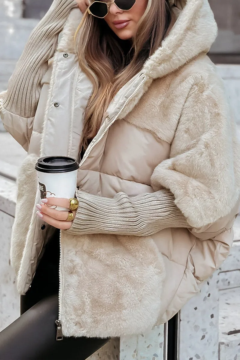 Beige plush hooded puffer jacket with zip front, faux-fur hood, ribbed sleeve cuffs