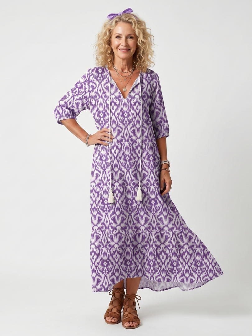 Purple printed midi dress with tie-neck, short sleeves, tiered skirt