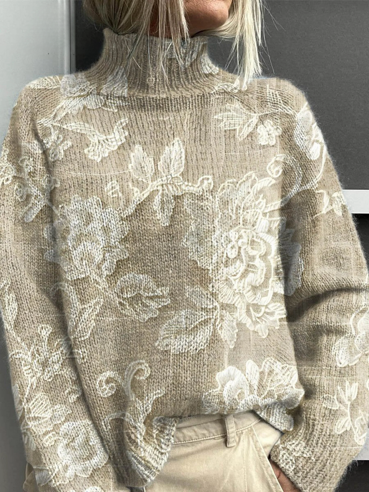 Beige turtleneck sweater with raised floral embroidery, long sleeves