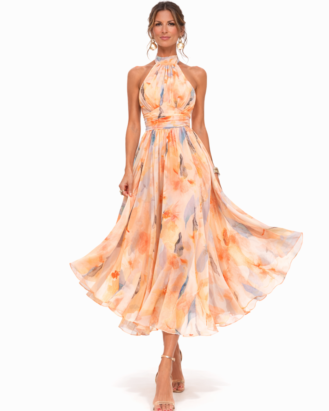 Halter watercolor maxi dress with peach, orange, and blue floral print, flowing tiered skirt