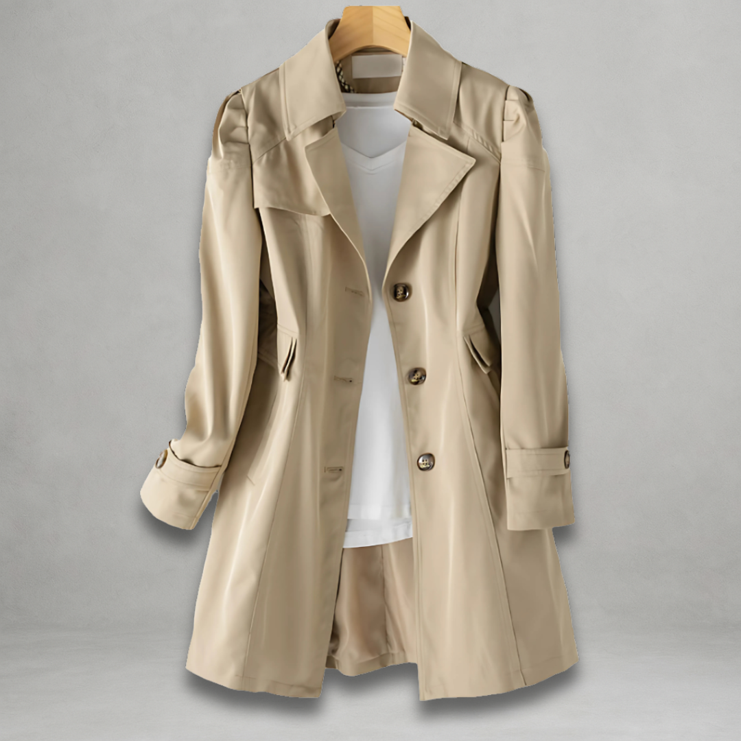 Cream trench coat with notched lapels, double-breasted buttons, and side flap pockets