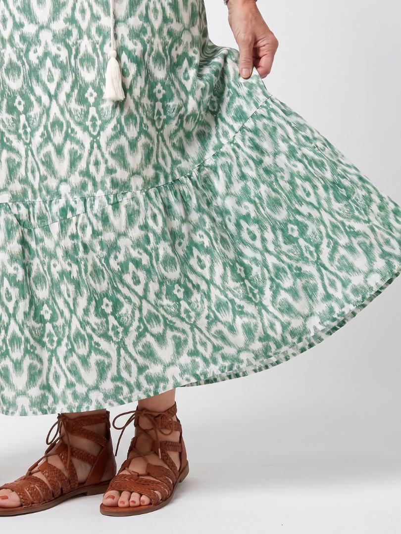 Green patterned V-neck tie midi dress with gathered tiered skirt hem