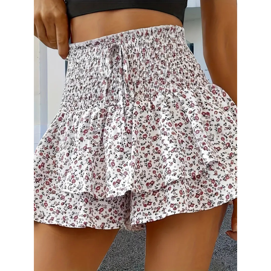 White floral tiered skort with shirred elastic waistband and layered ruffle skirt