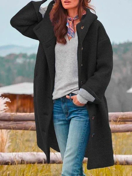 Black hooded long coat with button front and side flap accents