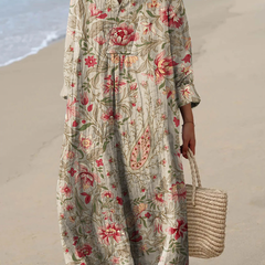 Boho maxi dress in beige with colorful floral print, V-neck and loose 3/4 sleeves