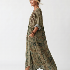 Green printed button-front midi dress with V-neck and side pockets, side view