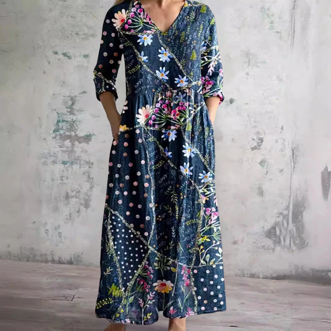 Navy floral summer dress with V-neck and 3/4 sleeves, tiered patchwork skirt