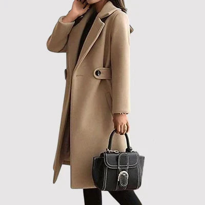 Beige belted classic coat with shoulder epaulet, notched lapels, button closure.