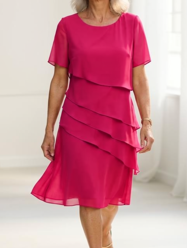 Hot pink ruffle dress with layered tiers, short sleeves, chiffon look, knee length