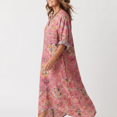Relaxed pocket midi dress with pink abstract print, V-neck, short sleeves, flowy hem