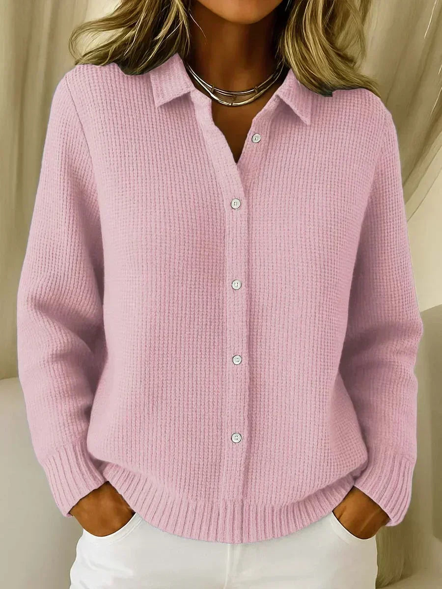 Pink textured knit button-up cardigan with long sleeves, button front, and collar