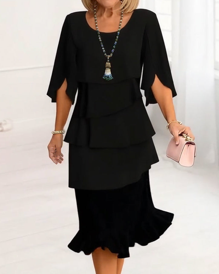 Black ruffle tier midi dress with short sleeves and layered skirt hem
