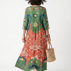 Back view of multicolor botanical print midi dress with V-neck and 3/4 sleeves