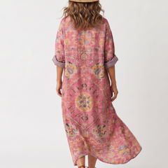 Pink abstract print relaxed pocket midi dress, V-neck and three-quarter sleeves, back view