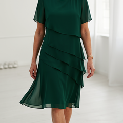 Green ruffle dress with layered tiers, short sleeves, chiffon look, knee length
