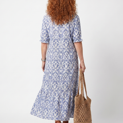 Blue printed tie-neck midi dress, back view with short sleeves