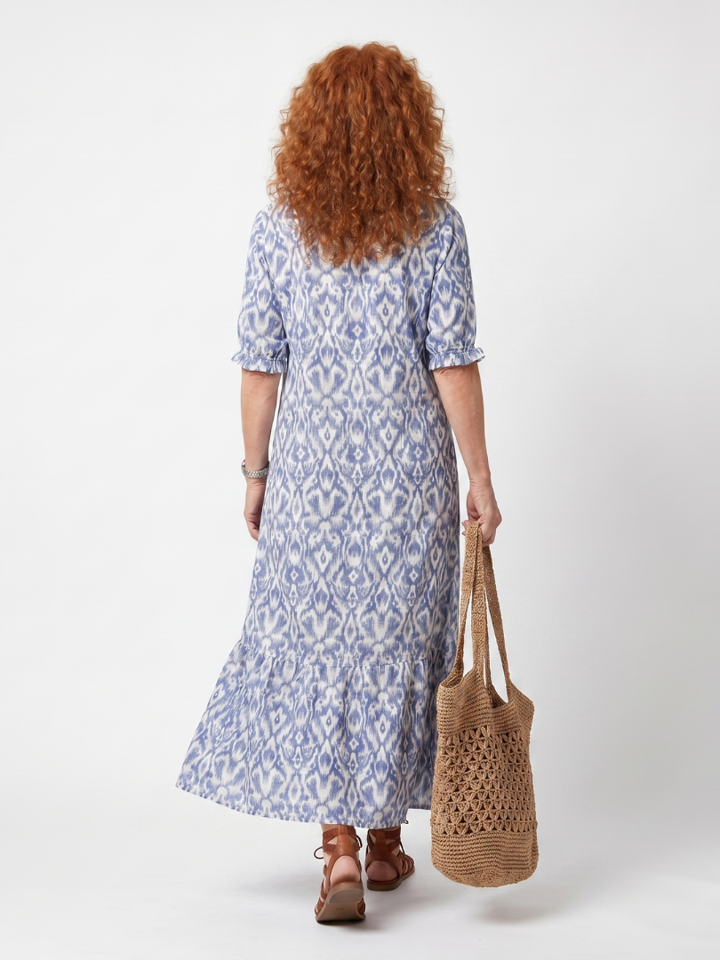 Blue printed tie-neck midi dress, back view with short sleeves