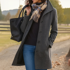 Charcoal gray single-breasted coat with notched lapel and dark button front