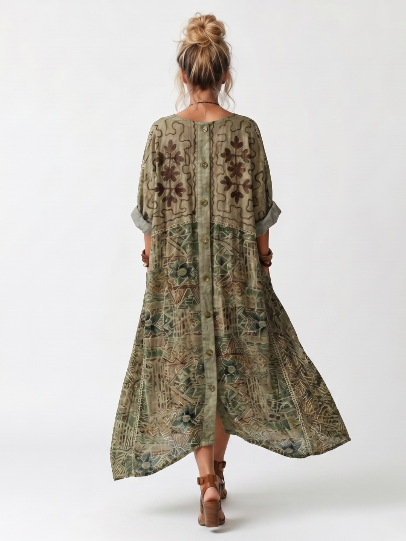 Green printed midi dress back view with button placket and draped asymmetrical hem