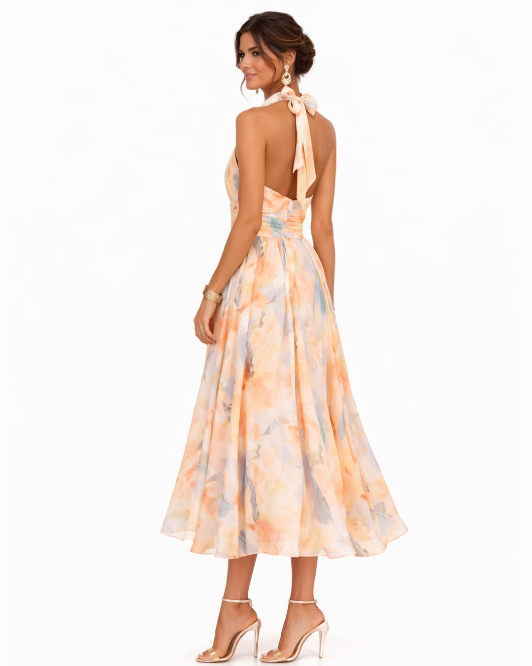 Halter watercolor maxi dress with peach and blue floral print, open back tie at neck