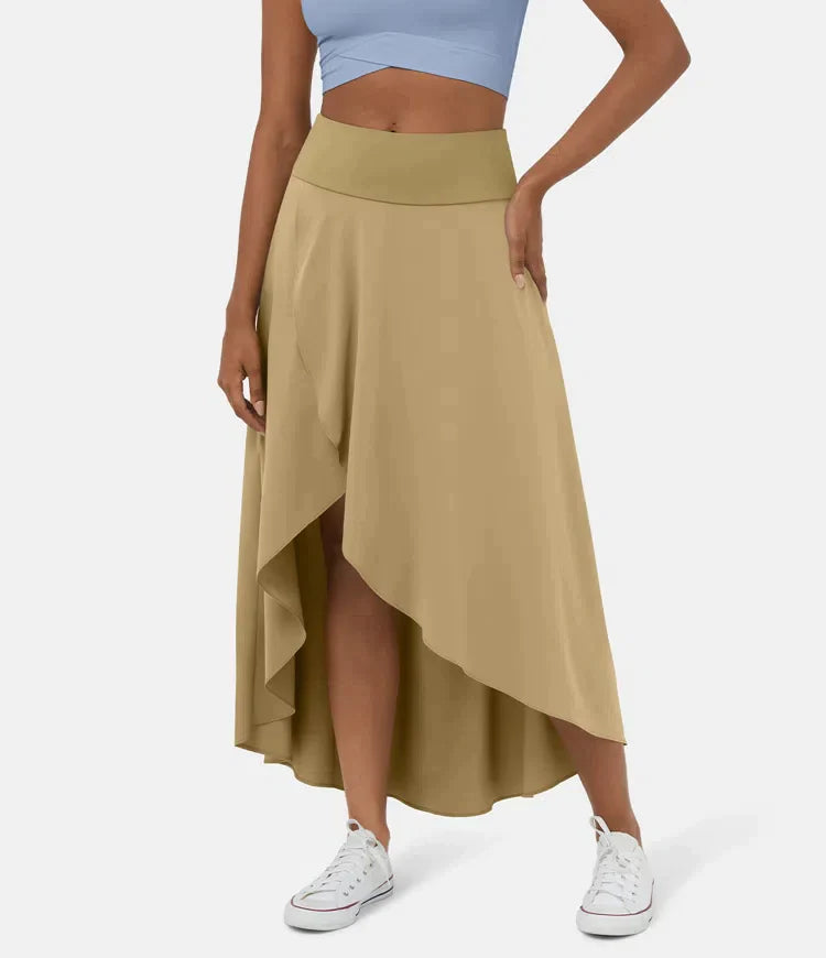 Asymmetric midi skirt in beige with high-low hem and draped side panel