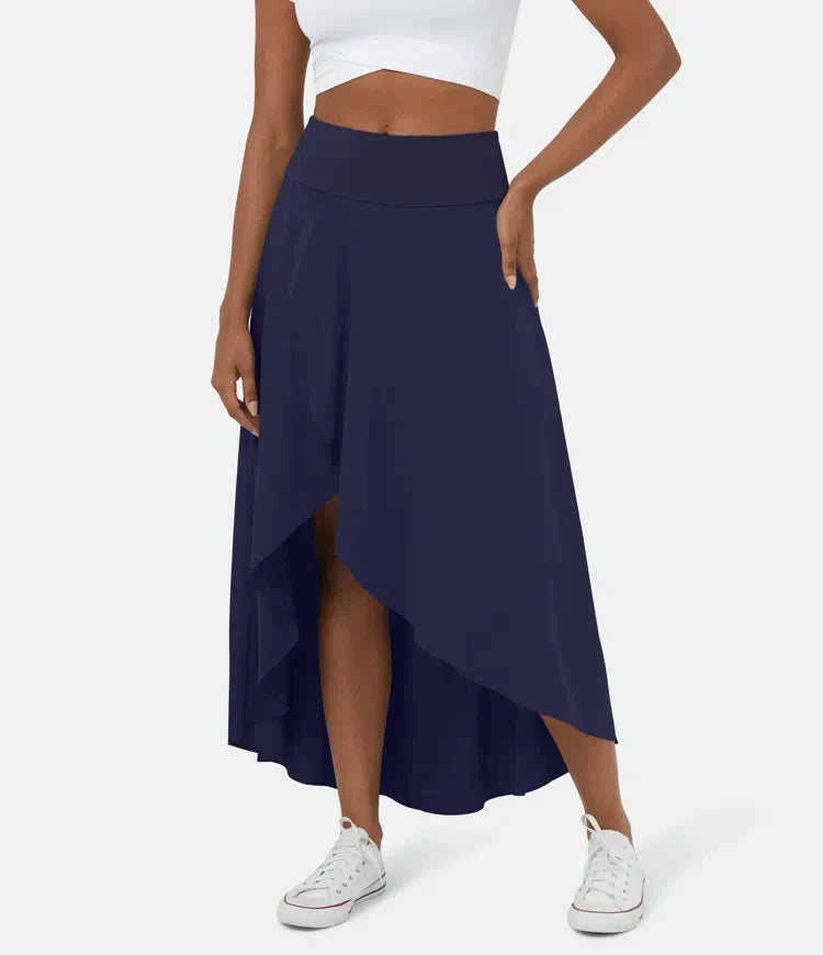 Asymmetric midi skirt in navy with high-low hem and draped side panel