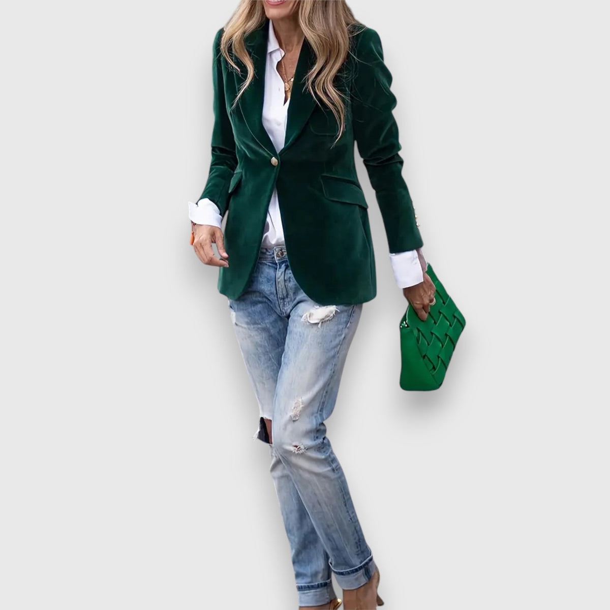 Women’s green blazer with notched lapels, single button, and two flap pockets
