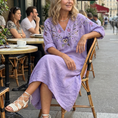 Purple floral pocket midi dress with embroidered V-neck and puff sleeves