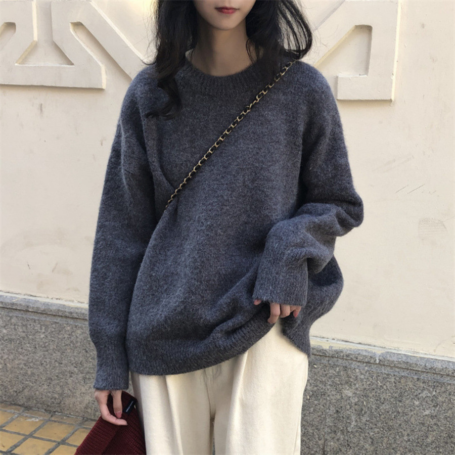 Dark gray round-neck long-sleeve knit sweater with ribbed cuffs and hem, relaxed fit